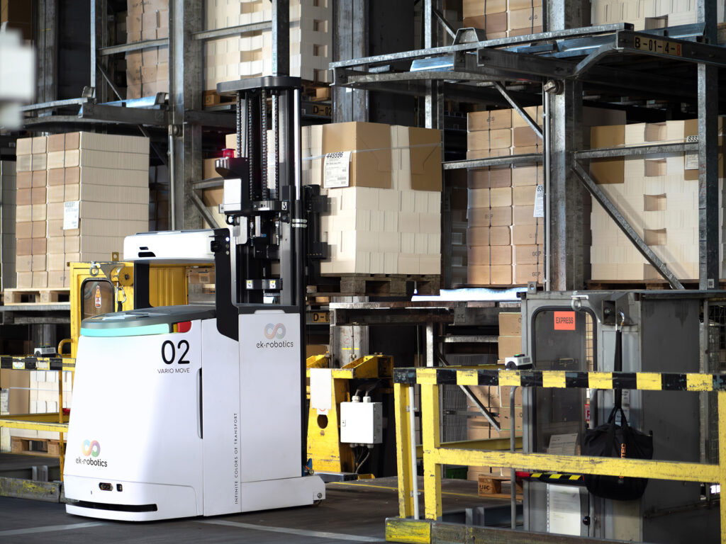 Logistics BusinessAGVs for Supply and Disposal of Printing Machines