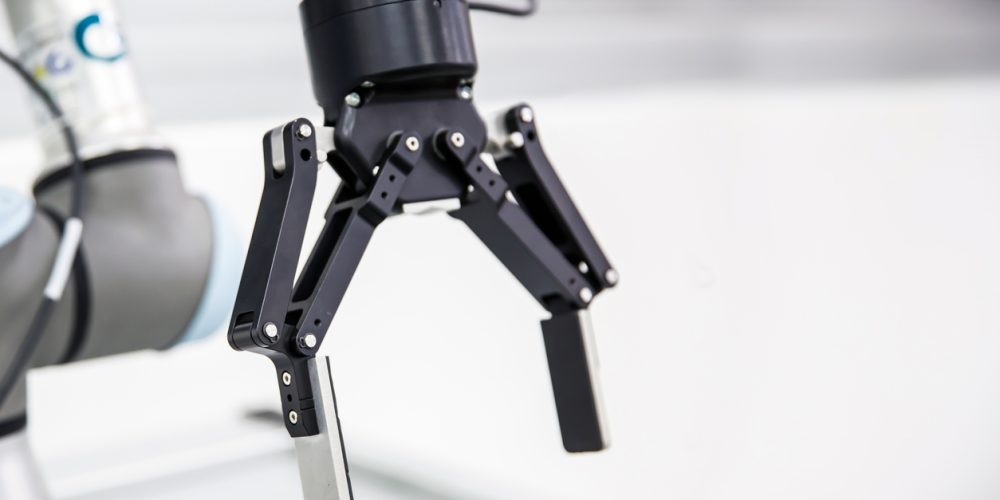 Robot arm cnc automation handling system for industrial manufacturing and factory production.