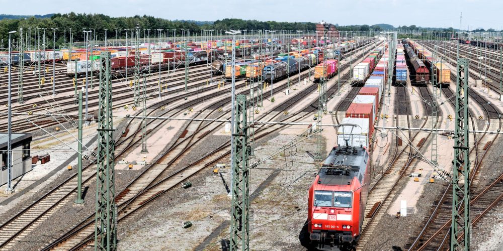 Expansive view of cargo trains at Hamburg's bustling rail terminal.